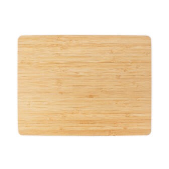 Rectangular bamboo cutting board isolated on a white background.