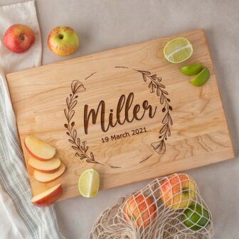 A Wooden Chopping Board with the name miller on it.