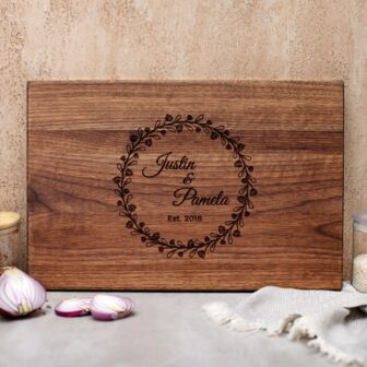 Engraved wooden wedding gift cutting board with customization