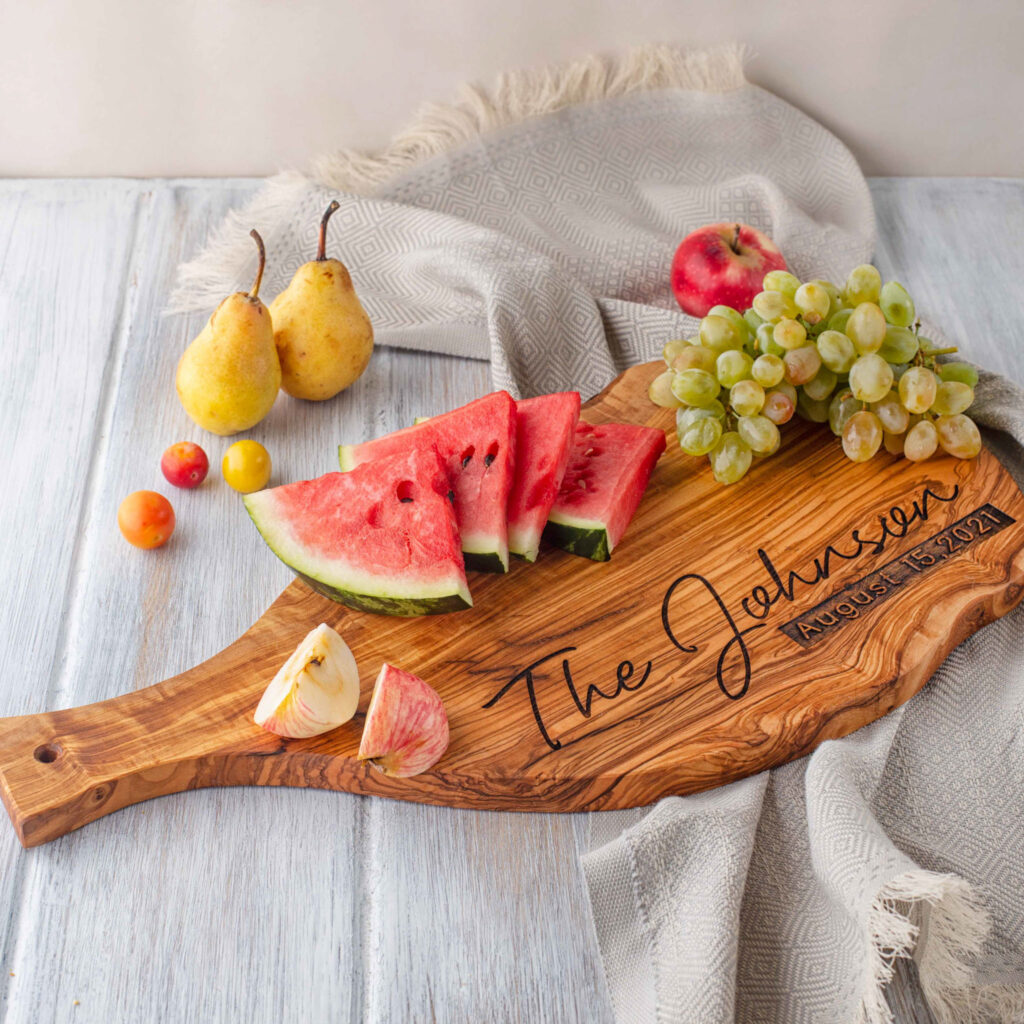 Engraved olive wood serving board for special occasions