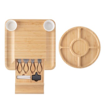 Bamboo cheese board set with slide-out drawer containing utensils, accompanied by a round cheese platter with sections.