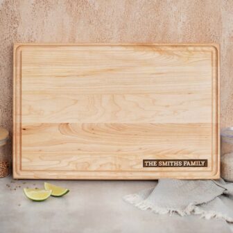 Personalized Wood Cutting Board with the family name on it.