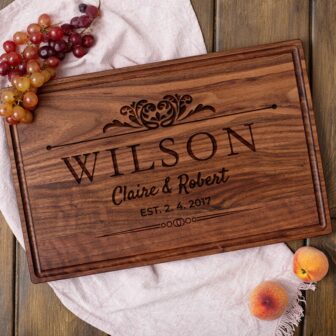 Wooden chopping block featuring a crest with personalization