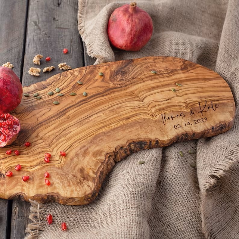 Wooden live edge serving board with personalization