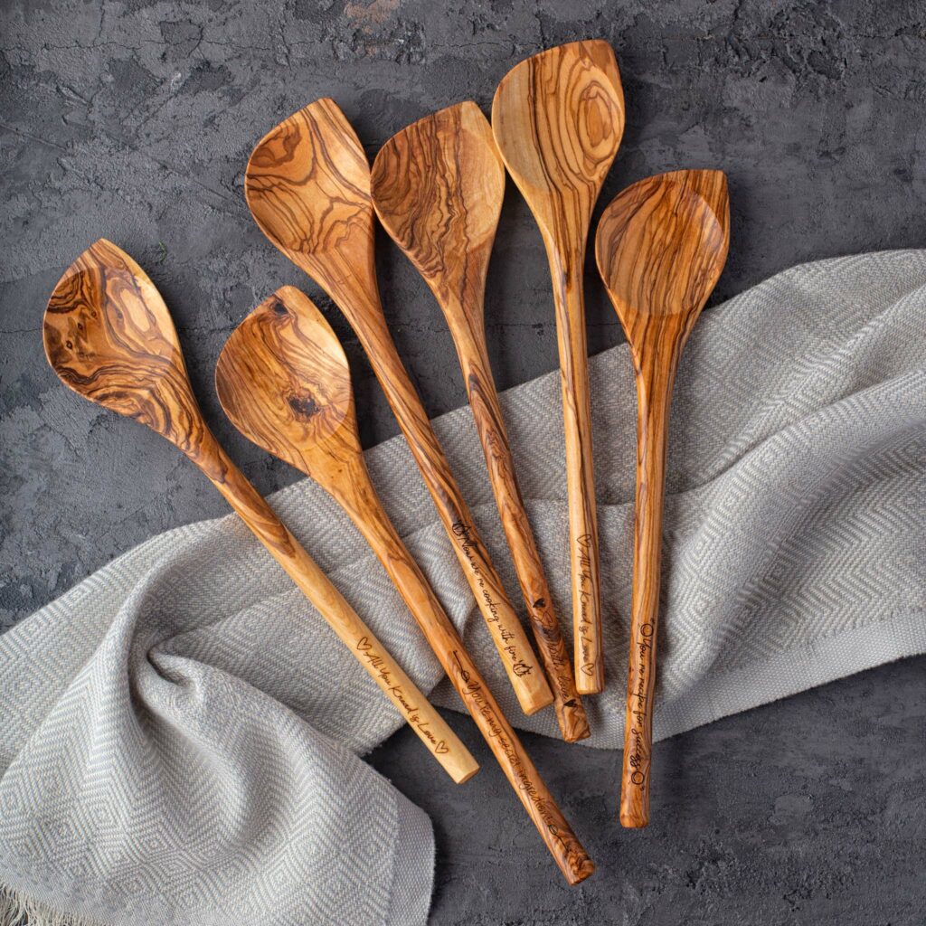 Wooden Spoons (Corner) – Set of 2 on a grey background.