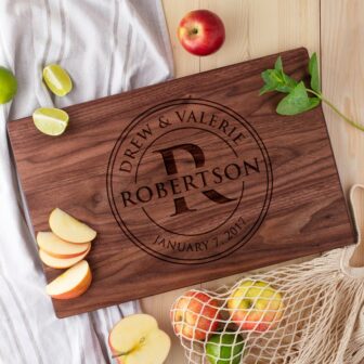 Personalized walnut cutting board as Wedding Shower Gift.