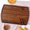 Personalized wooden cutting board.