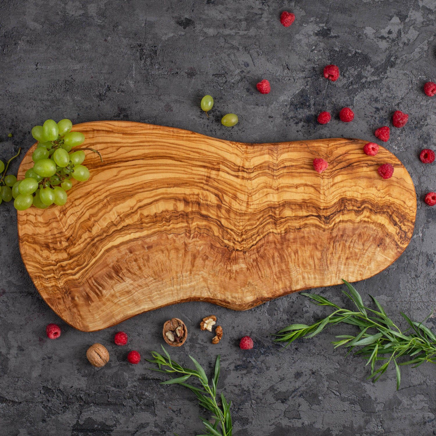 Custom oval wood cutting surface for cooking enthusiasts