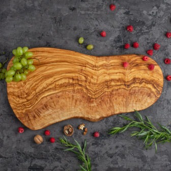 Custom oval wood cutting surface for cooking enthusiasts