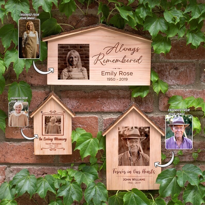 A wooden plaque with a photo of a family in a house.