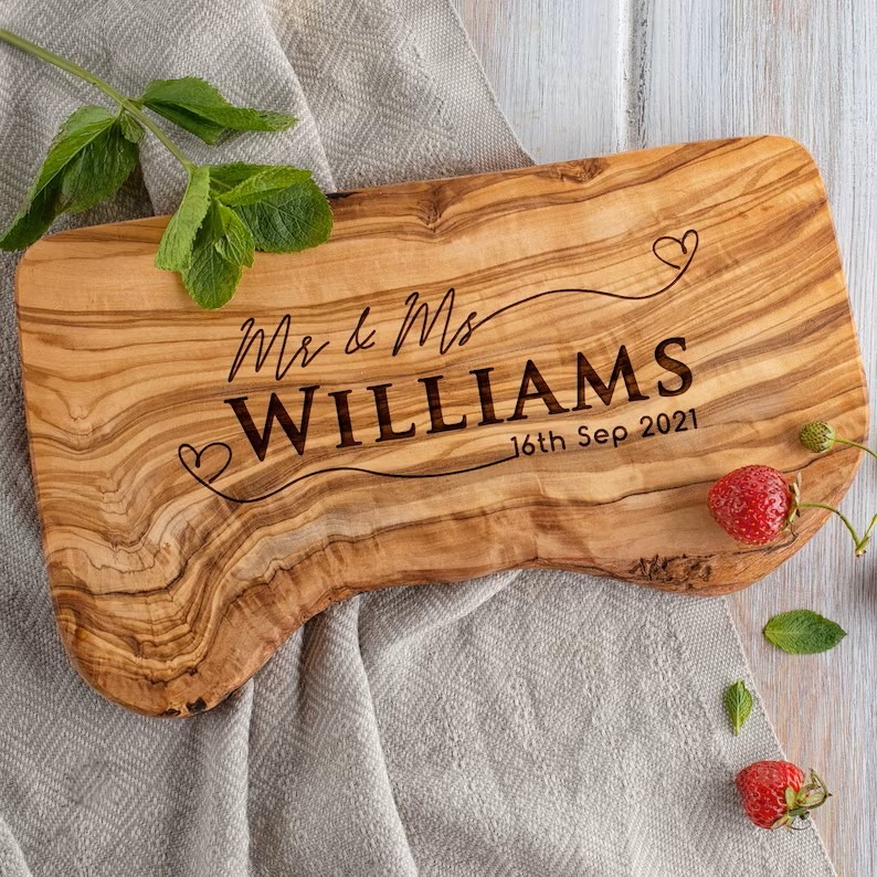 Live edge wood serving board with handles and engraving