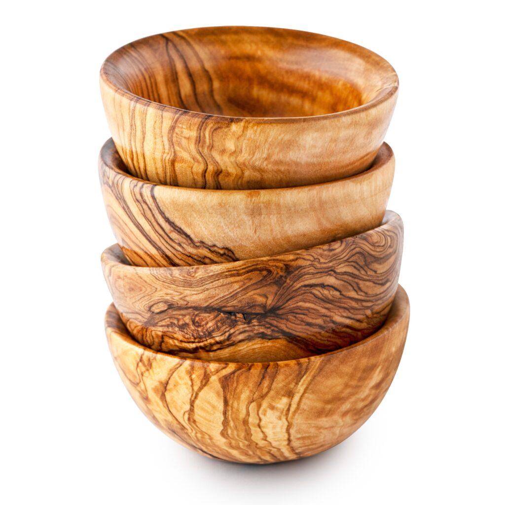 Four wooden bowls stacked on top of each other.
