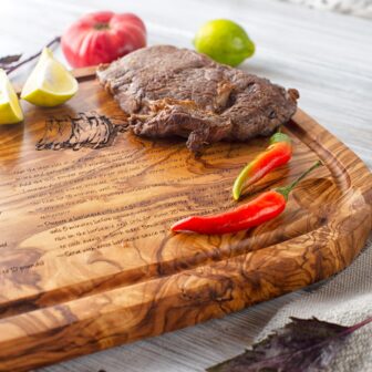 A Custom Cutting Board with a steak on it.