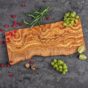 Elegant live edge wooden cutting board as personalized kitchenware gifts