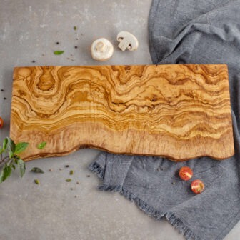 Live edge wood serving board as personalized wood gifts