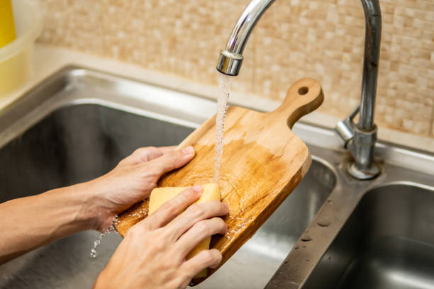 hand washing wooden olive boards