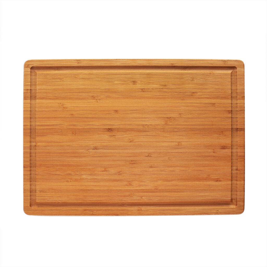 Wooden cutting board isolated on a white background.