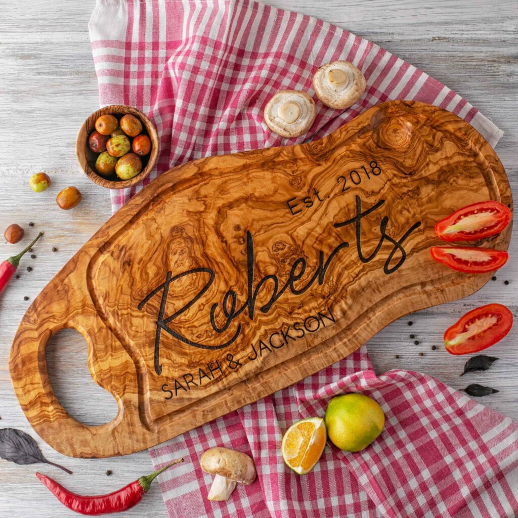 A Personalized BBQ Cutting Board with the name Roberts on it.