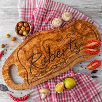A Personalized BBQ Cutting Board with the name Roberts on it.