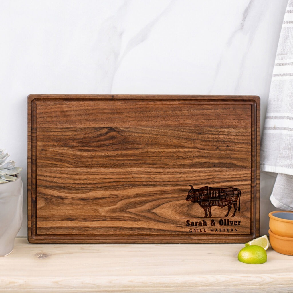 A wooden cutting board with an image of a cow.