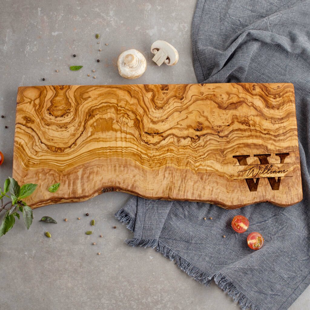 Live edge olive wood board for gourmet enthusiasts