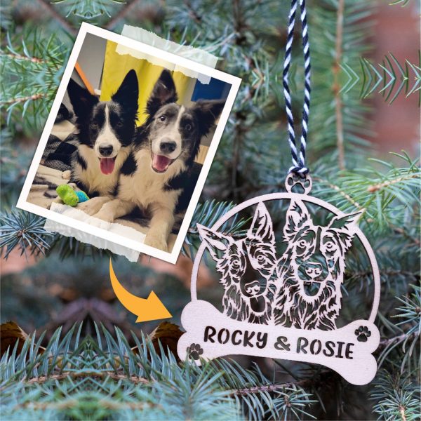 A personalized christmas ornament with a photo of a dog and a cat.