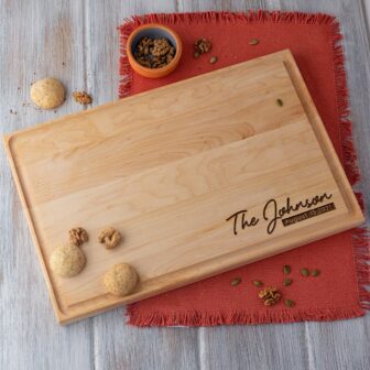 Custom wooden cutting board for cooking enthusiasts as a wedding gift