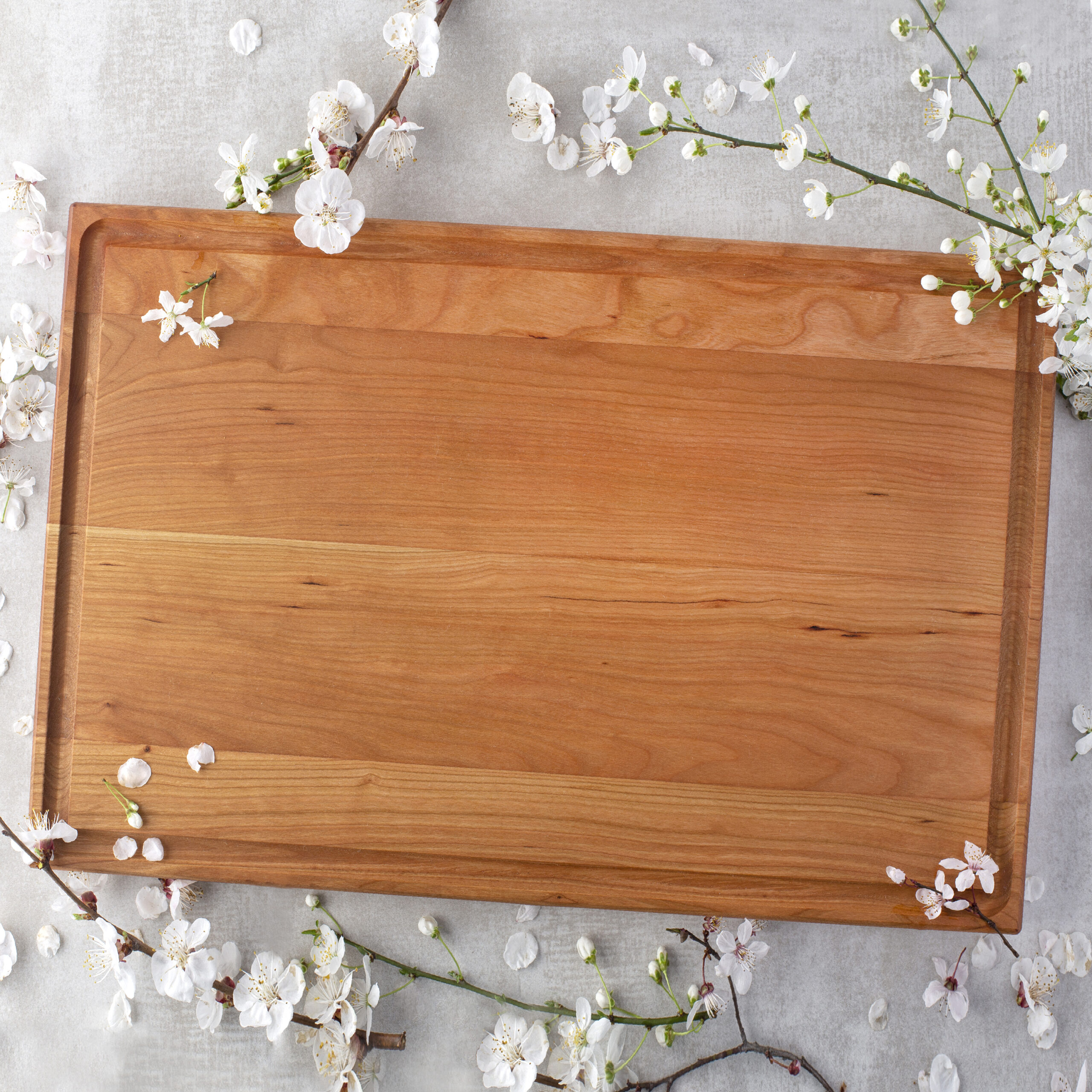 https://forest-decor.com/wp-content/uploads/Large-Wood-Cutting-Board-with-Juice-Groove-Cherry-17x11-2-scaled.jpg