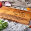 An Olive Wood Recipe Cutting Board with a recipe for BBQ ribs.