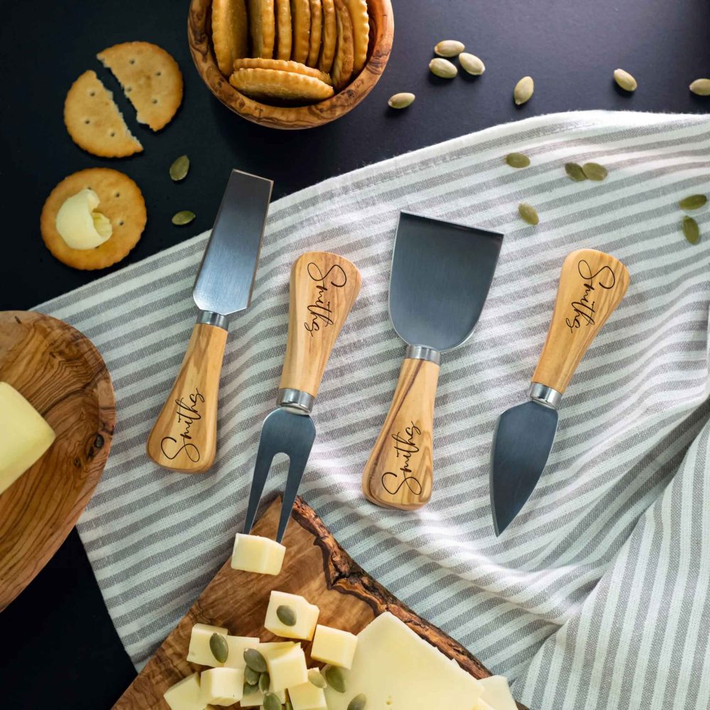 Cheese knives with name-engraved olive wood handles