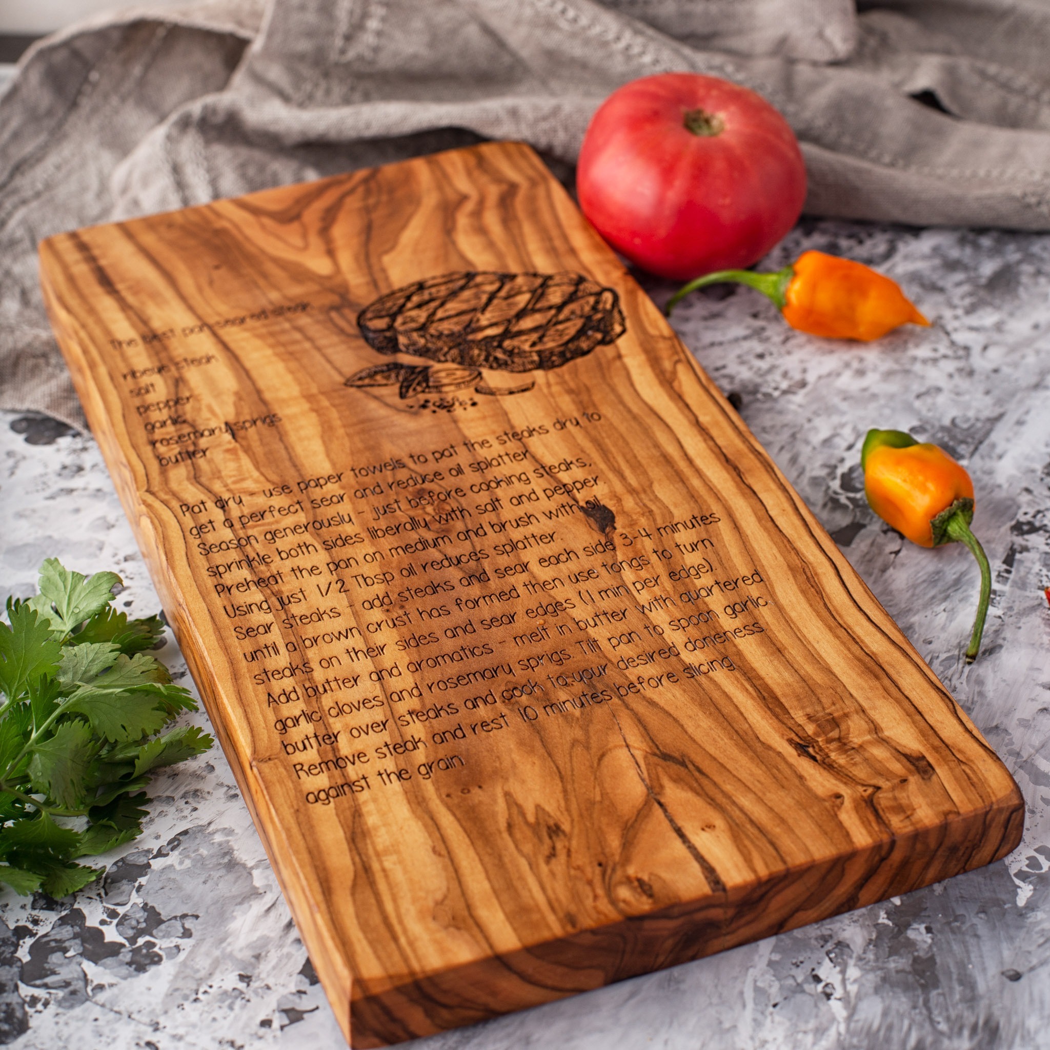 Three Olivewood-Handled Knives & Cutting Board