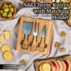 Wooden cheese knife set with holder displayed alongside crackers and olives on a table.