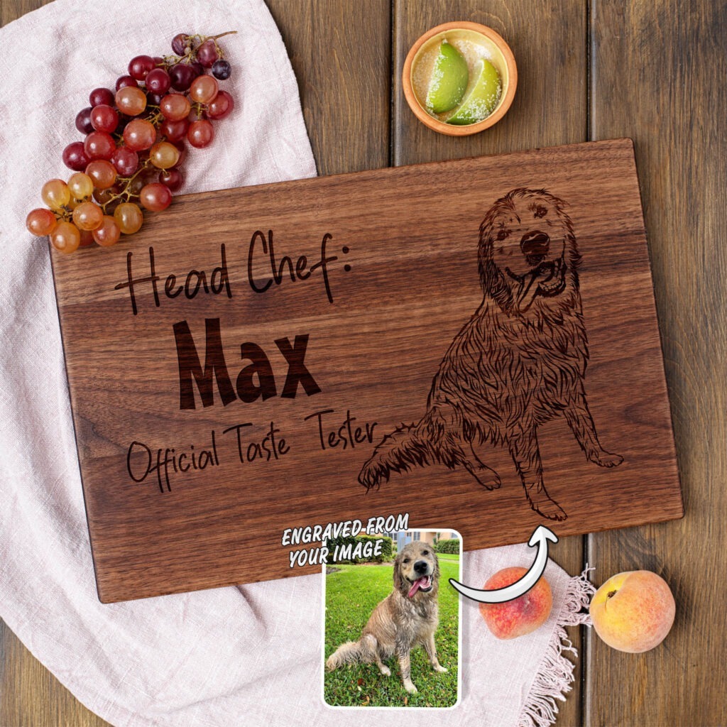 A wooden cutting board with a picture of a dog and grapes.