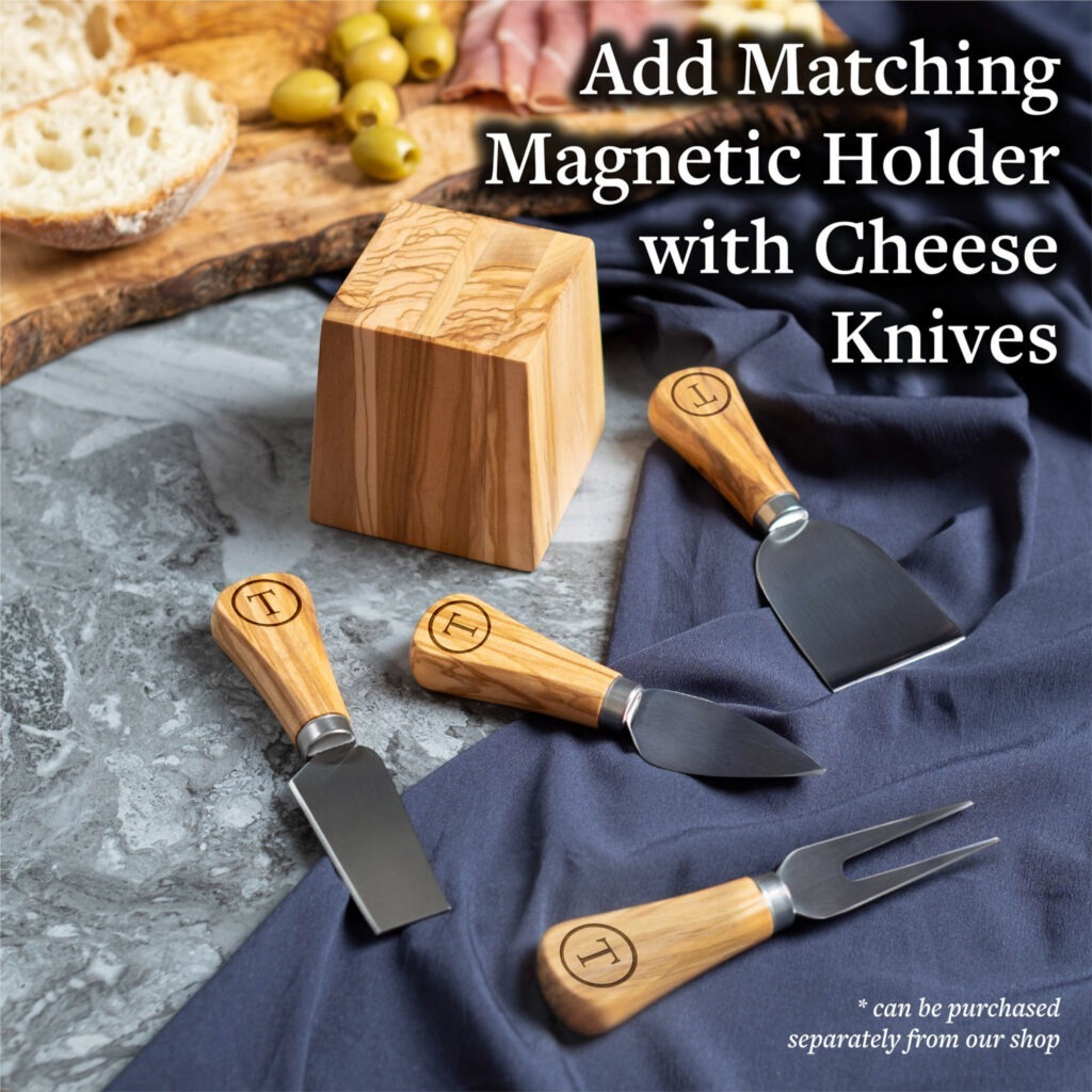 Elegant cheese knives set with a wooden magnetic holder, available as an additional purchase.