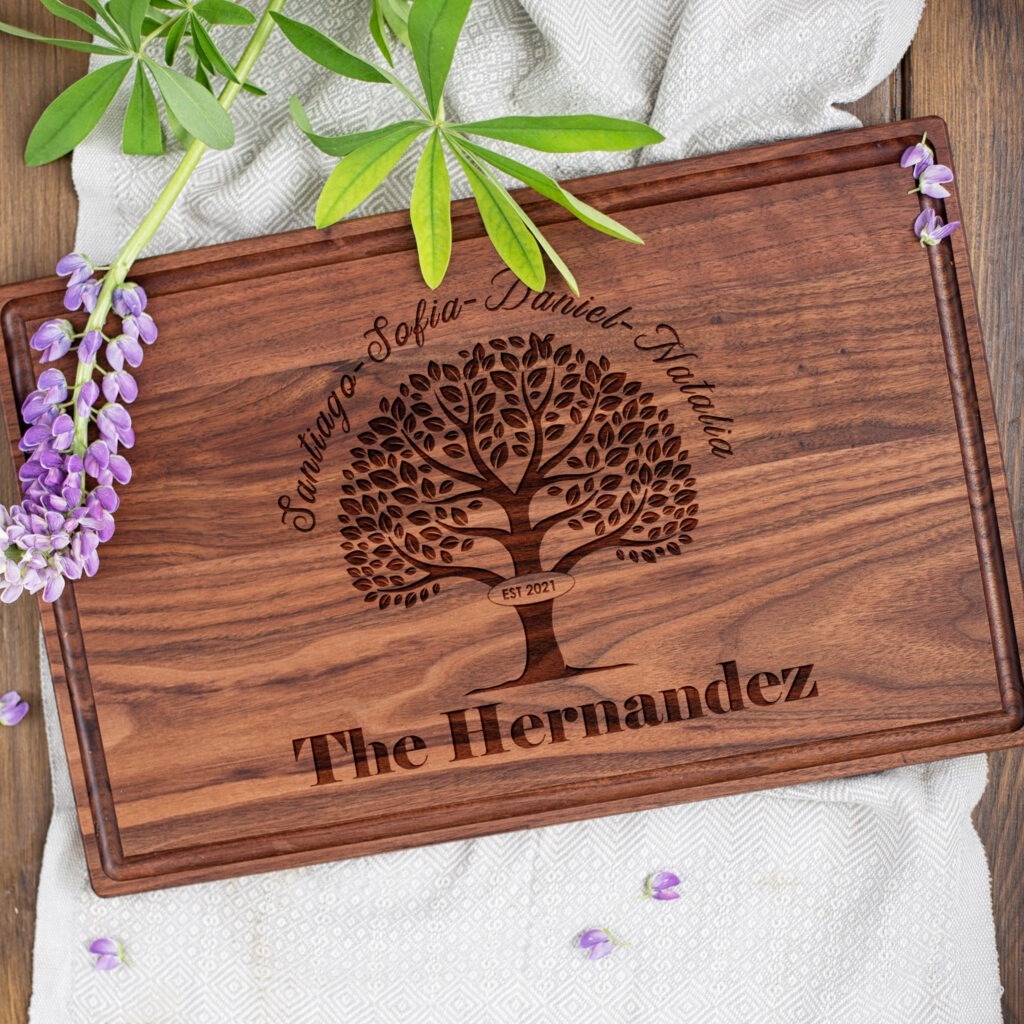 A wooden cutting board with a family tree on it.
