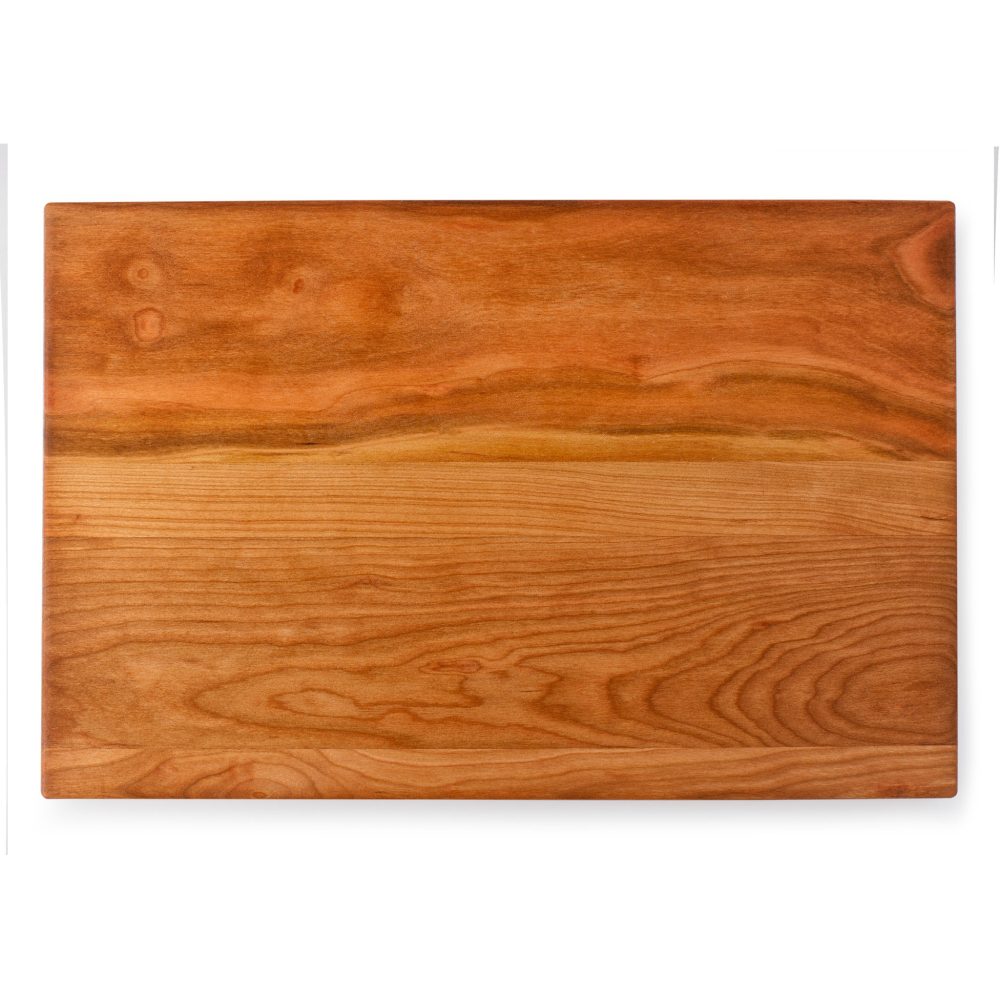A wood cheese board on a white background.