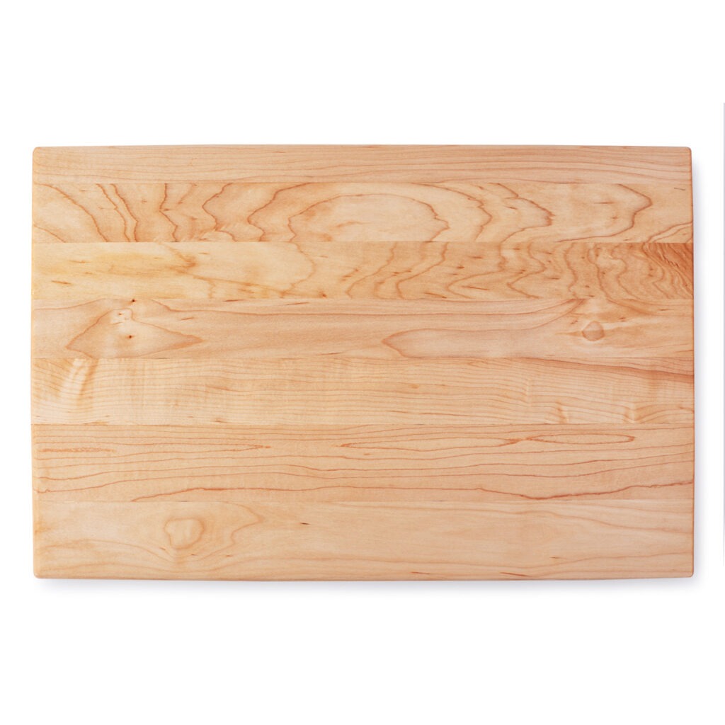 clean wood cutting board on a white background.