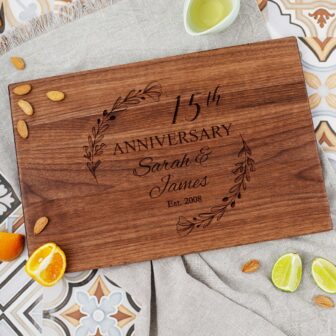 Personalized 15th anniversary walnut cutting board.
