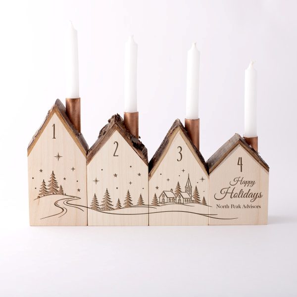 Advent candle holder engraved with a company holiday greeting