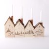 Advent candle holder with a logo engraved on the fourth house