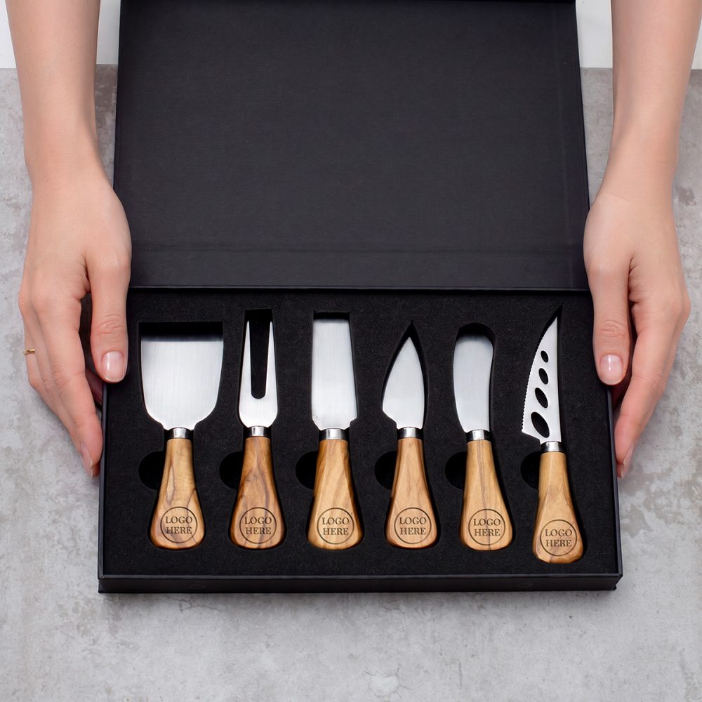 6-piece cheese knife set with logo-engraved handles in a black box