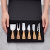 6-piece cheese knife set with logo-engraved handles in a black box