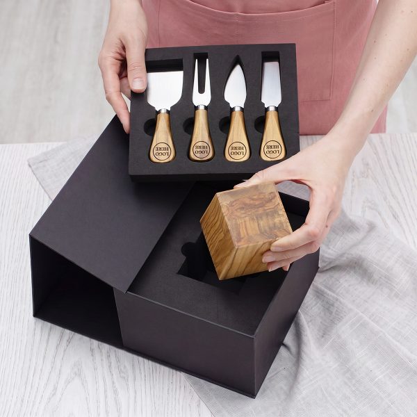 Logo-engraved cheese knives and magnetic stand in a black gift box