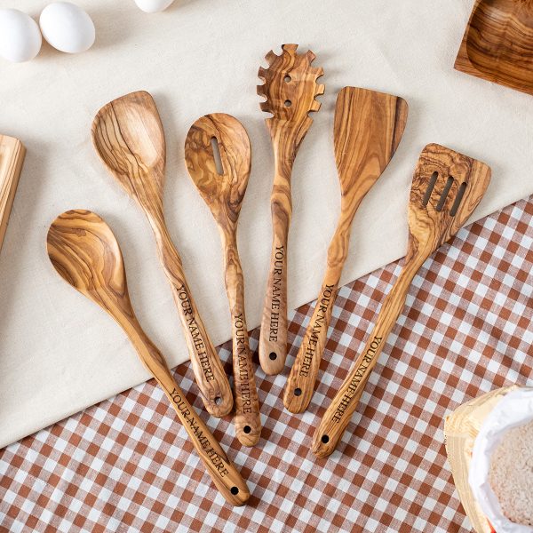 Olive wood utensil set with a company name engraved on every handle