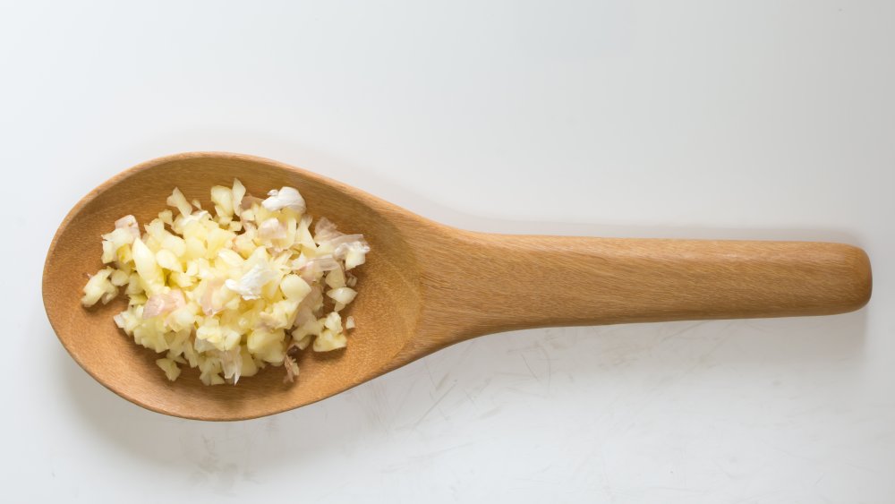 Garlic in a wooden spoon