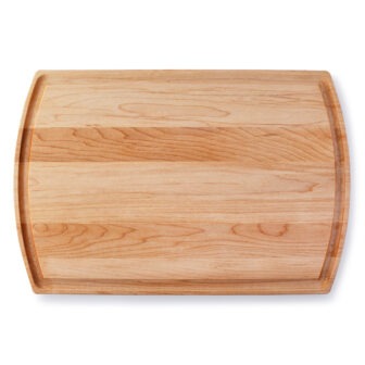 A rustic chopping board on a white background.