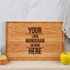 A wooden cherry cutting board with your logo and monogram design.