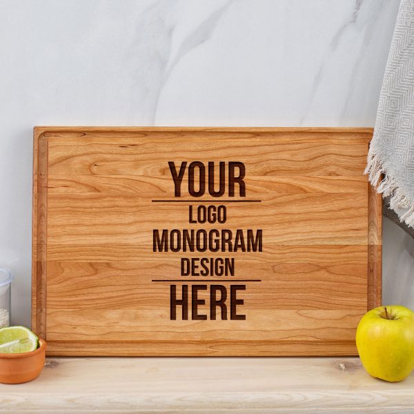 A wooden cherry cutting board with your logo and monogram design.