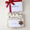 Personalized advent candle gift box with a wooden snowflake ornament