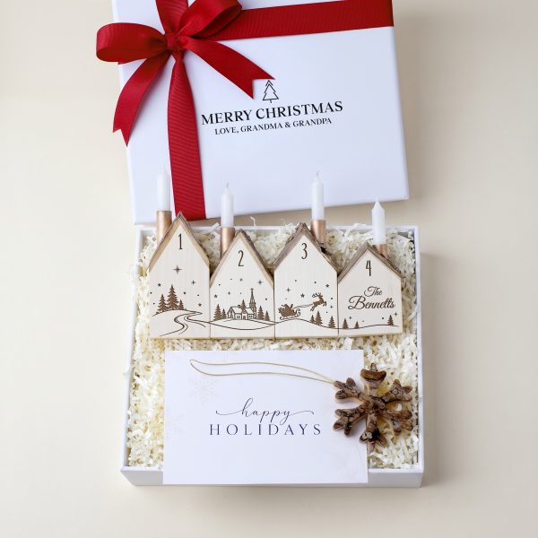 Personalized advent candle gift box with a wooden snowflake ornament